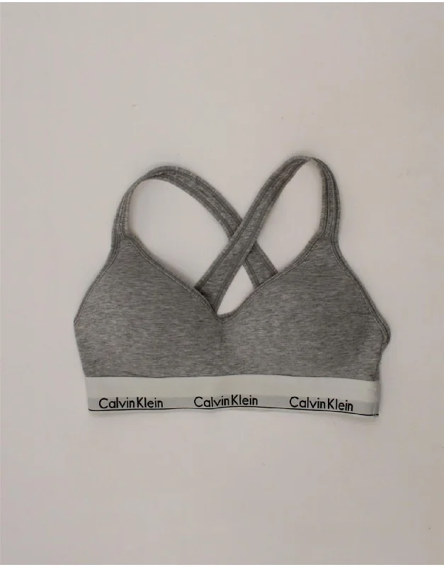 Elegant Feminine Style Elegant Feminine Style CALVIN KLEIN Womens Graphic Sport Bra Top UK 12 Medium Grey